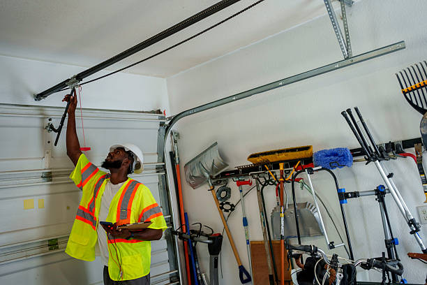 Professional Garage Door Panel Replacement technician working in Clarks Summit, PA